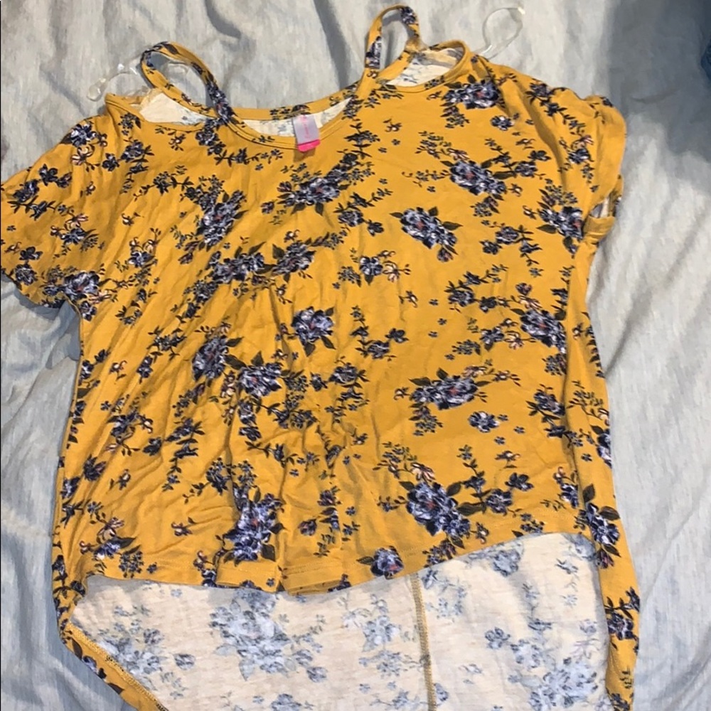 • no boundaries• yellow shirt with blue floral